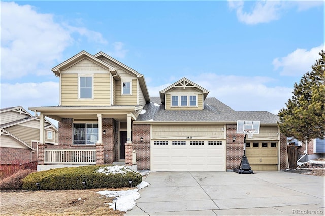 craftsman house with a garage and covered porch