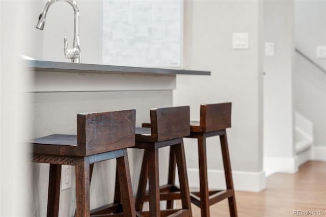 dining area featuring hardwood / wood-style floors