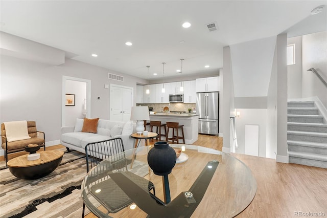 living room featuring light hardwood / wood-style floors