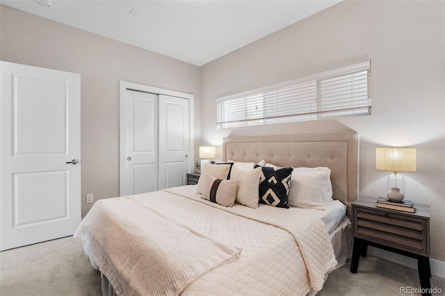 carpeted bedroom with a closet