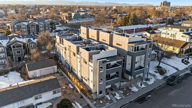 birds eye view of property featuring a mountain view