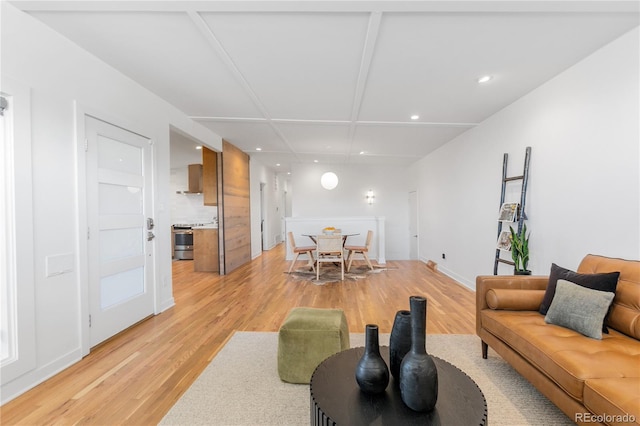 3035 E Maplewood Ave, Centennial, CO 80121 - living room with light wood-type flooring, recessed lighting, and baseboards