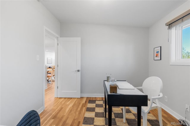 3035 E Maplewood Ave, Centennial, CO 80121 - office area featuring light wood-style floors and baseboards