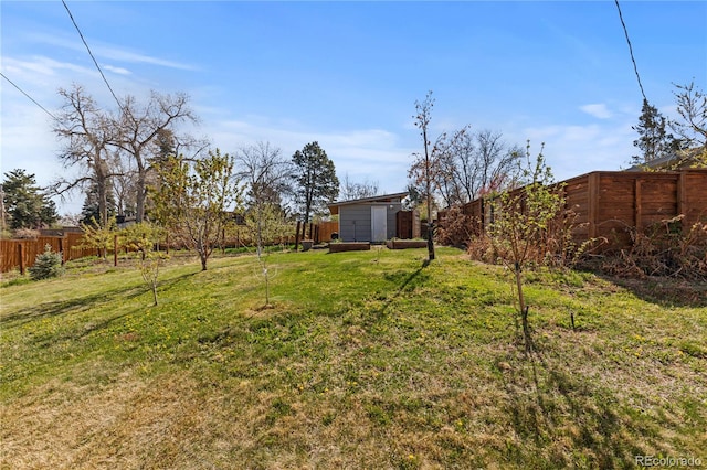 3035 E Maplewood Ave, Centennial, CO 80121 - view of yard with an outdoor structure and a fenced backyard
