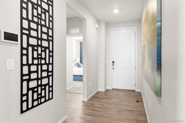 22374 E 49th Pl, Aurora, CO 80019 - hall featuring wood finished floors and baseboards