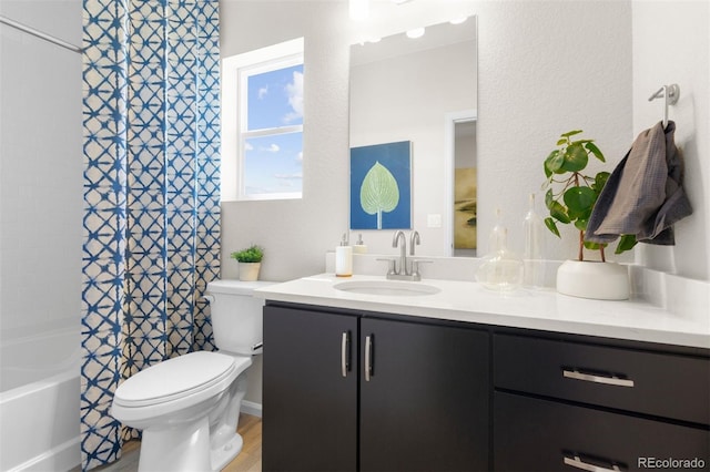 22374 E 49th Pl, Aurora, CO 80019 - full bath featuring vanity, shower / tub combo, and wood finished floors