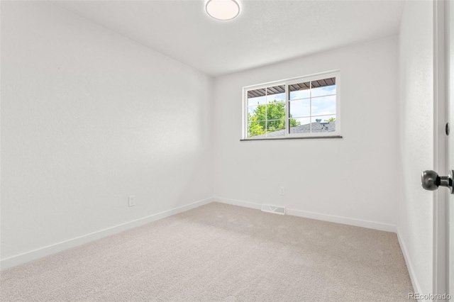 13010 W 6th Pl, Golden, CO 80401 - empty room featuring baseboards and light colored carpet