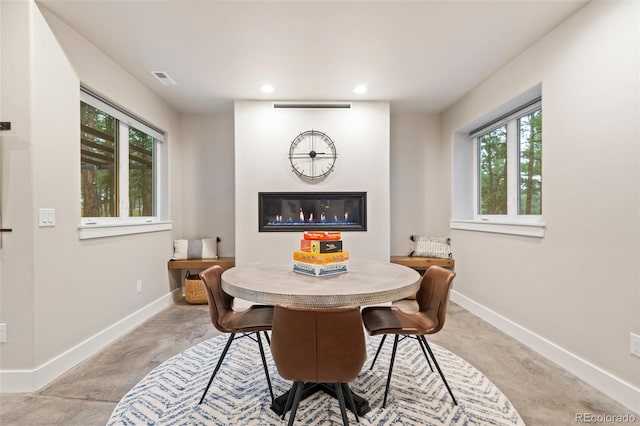 dining area with a wealth of natural light