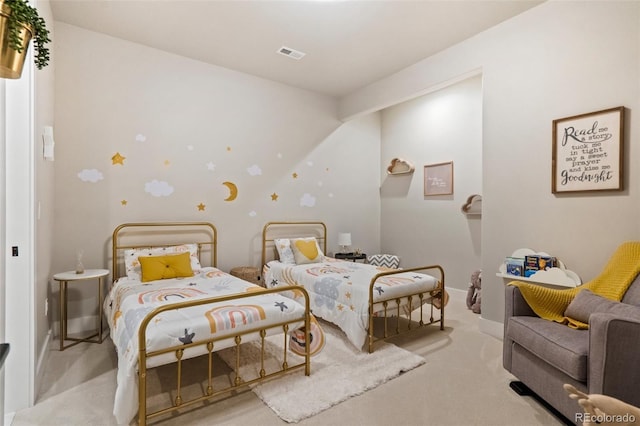 bedroom with carpet flooring, baseboards, and visible vents