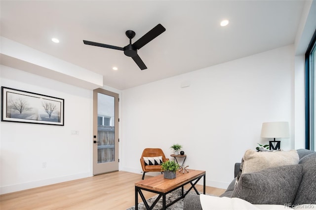 3433 Lawrence St Unit 1, Denver, CO 80205 - sitting room featuring ceiling fan, light wood-style floors, recessed lighting, and baseboards
