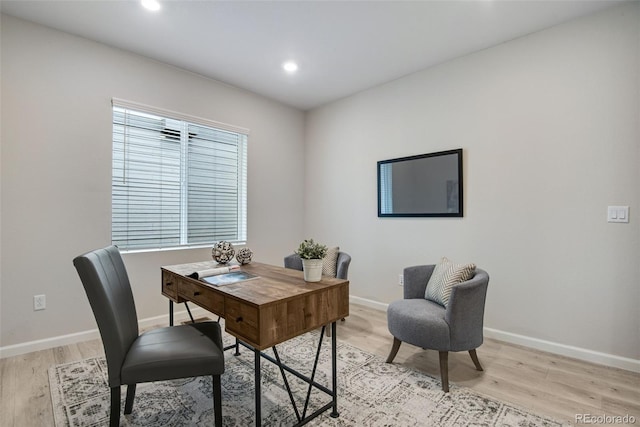 office area with light wood-type flooring