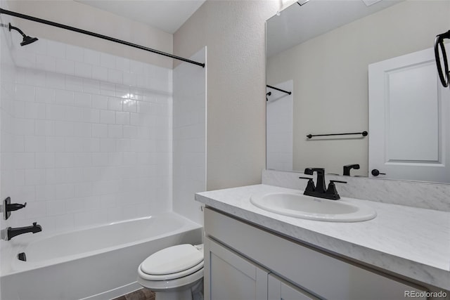 full bathroom featuring vanity, shower / washtub combination, and toilet