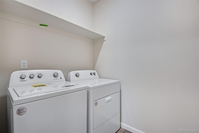 13351 E 100th Pl, Commerce City, CO 80022 - laundry area with independent washer and dryer, laundry area, and baseboards
