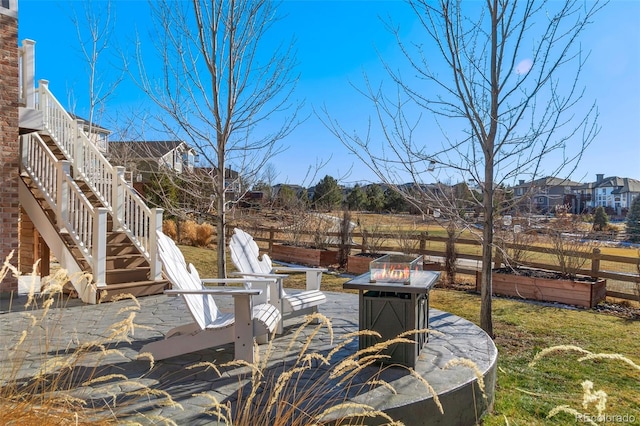 exterior space featuring an outdoor fire pit