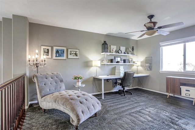 office featuring ceiling fan with notable chandelier and dark carpet