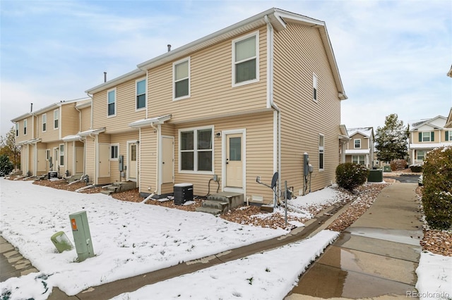 view of snow covered property