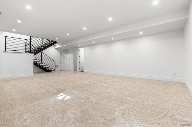 unfurnished living room with light carpet