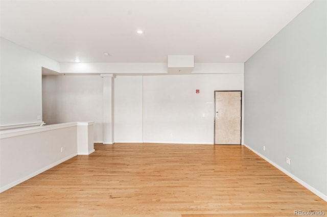 unfurnished room featuring light wood-type flooring