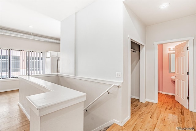 hall featuring light hardwood / wood-style flooring