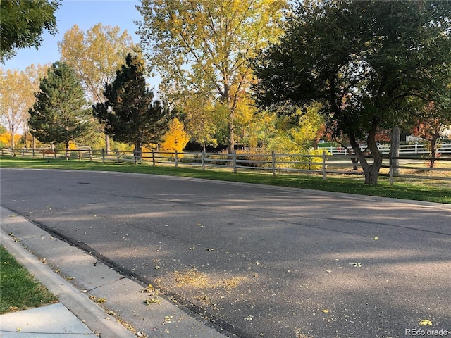 995 W Peakview Cir, Littleton, CO 80120 - view of asphalt street featuring curbs