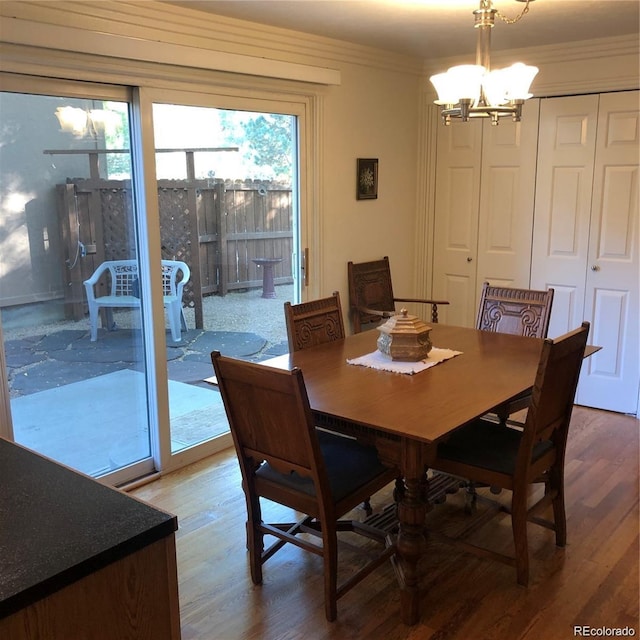 995 W Peakview Cir, Littleton, CO 80120 - dining area with a chandelier and wood finished floors