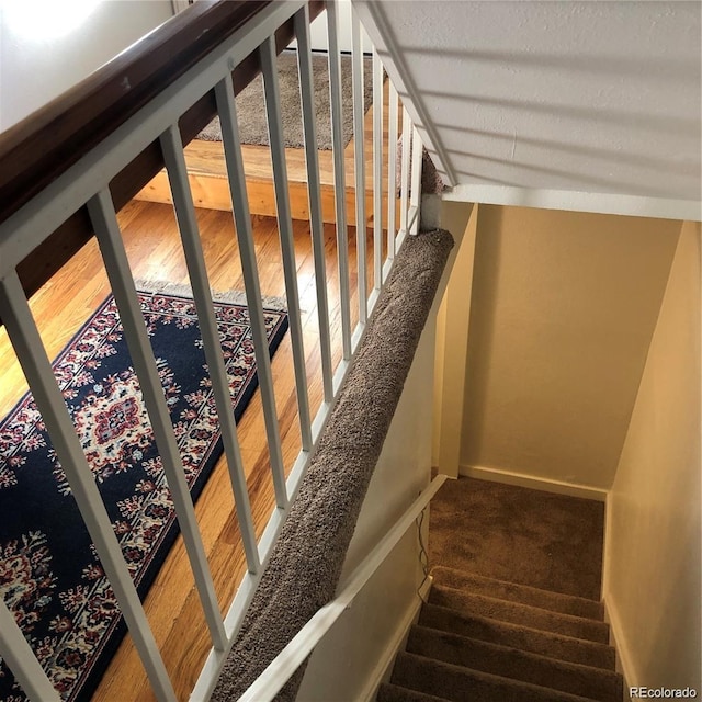 995 W Peakview Cir, Littleton, CO 80120 - stairway featuring baseboards