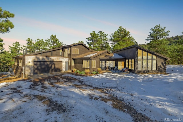 view of front of property featuring a garage