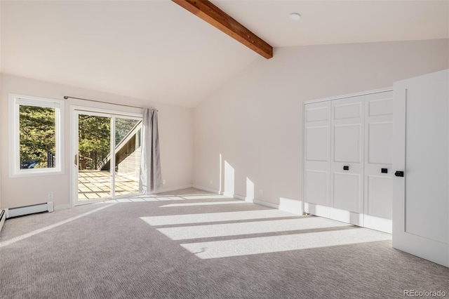 interior space featuring carpet floors, baseboards, and vaulted ceiling with beams