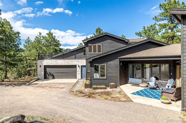 view of front of house featuring a garage and driveway