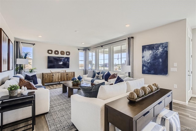 1320 Loraine Cir N, Lafayette, CO 80026 - living room with wood finished floors, recessed lighting, and baseboards