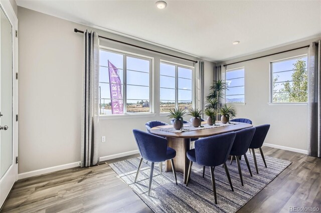 1320 Loraine Cir N, Lafayette, CO 80026 - dining room featuring wood finished floors, baseboards, and recessed lighting