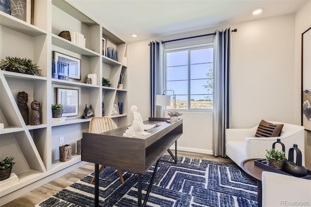 1320 Loraine Cir N, Lafayette, CO 80026 - office area featuring wood finished floors and baseboards