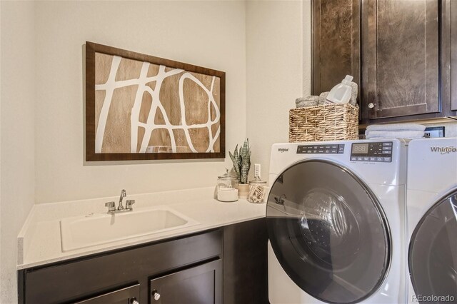 1320 Loraine Cir N, Lafayette, CO 80026 - washroom with cabinet space and washing machine and dryer