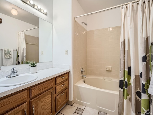 bathroom featuring shower / bath combination with curtain, vanity, and tile patterned floors