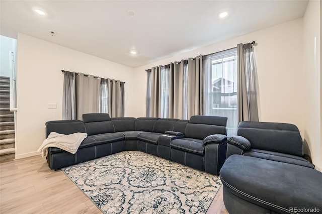 living room with light hardwood / wood-style flooring