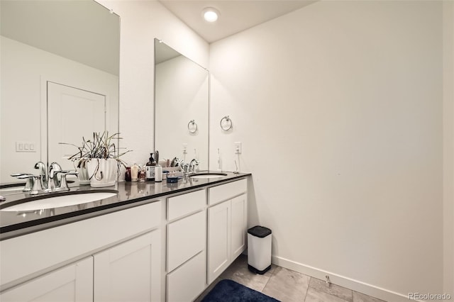 bathroom featuring vanity and tile patterned floors