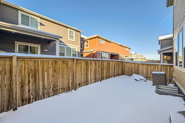 view of yard covered in snow