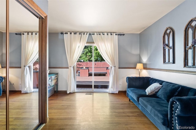 living room with wood-type flooring