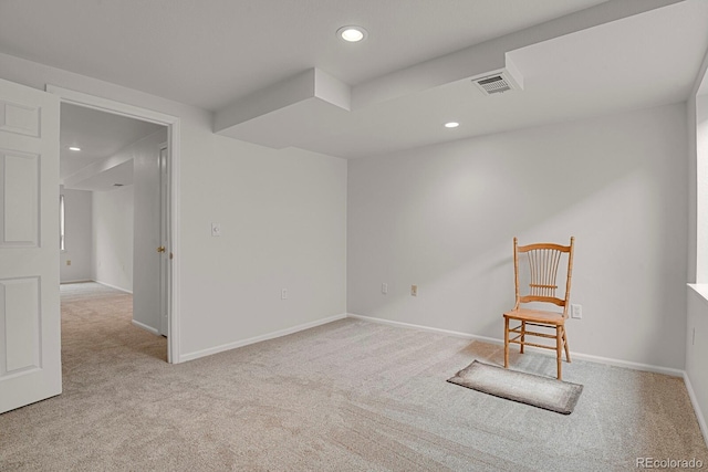 spare room with baseboards, visible vents, light colored carpet, and recessed lighting