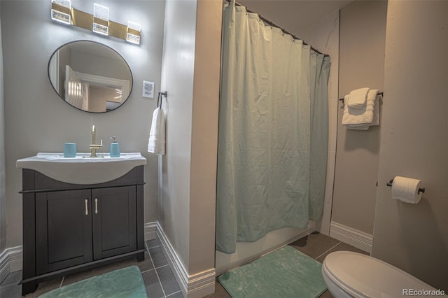 full bathroom featuring tile patterned flooring, vanity, shower / bath combo, and toilet