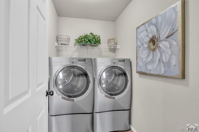 laundry room featuring independent washer and dryer