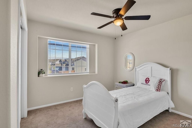 bedroom featuring ceiling fan and light colored carpet