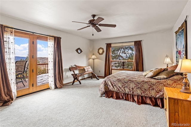 bedroom with access to exterior, carpet, and a ceiling fan