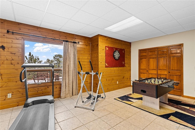 workout room with wood walls