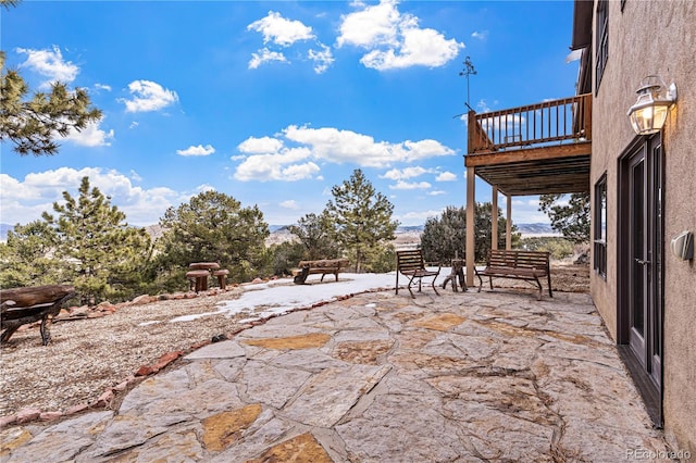 view of yard featuring a balcony and a patio area