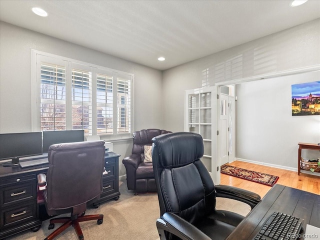 office with light wood finished floors, baseboards, and recessed lighting