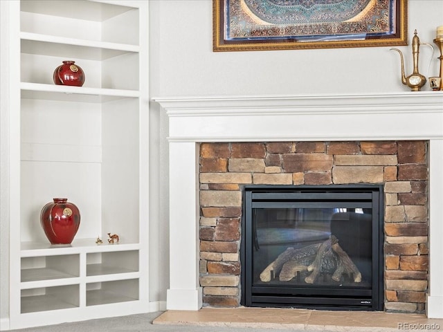 interior details with a fireplace and built in features