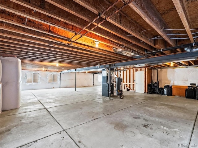 unfinished basement with heating unit