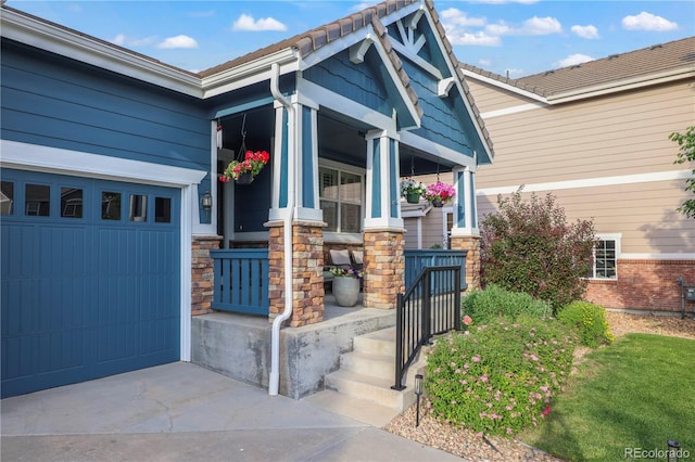 23327 E Ottawa Dr, Aurora, CO 80016 - property entrance featuring covered porch and driveway