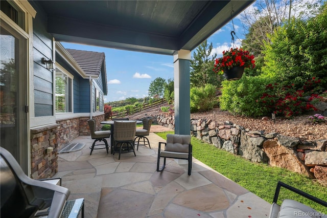 23327 E Ottawa Dr, Aurora, CO 80016 - view of patio featuring outdoor dining area